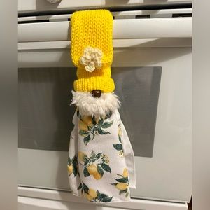 Handmade Gnome towel holders with towel.